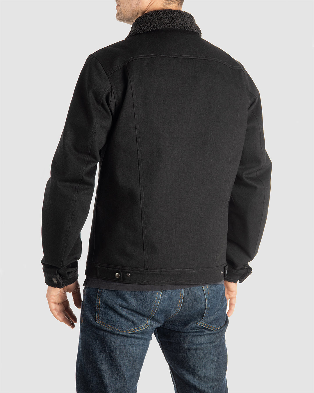 Rear view of Husky Jacket, made from 12oz comfort-stretch CORDURA® denim with 3M thermal insulation and quilted padding, ideal for transitional weather and designed for urban riders