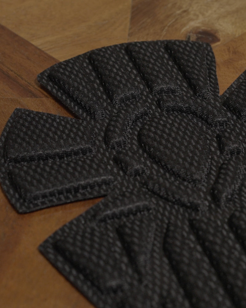 Close-up of moisture-wicking, antimicrobial fabric covering on reusable protective knee pad