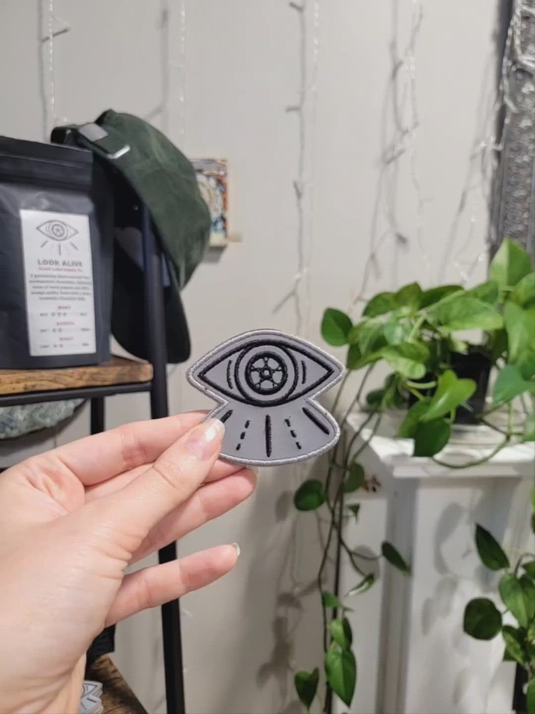 Full view of reflective black and white patch with eye design