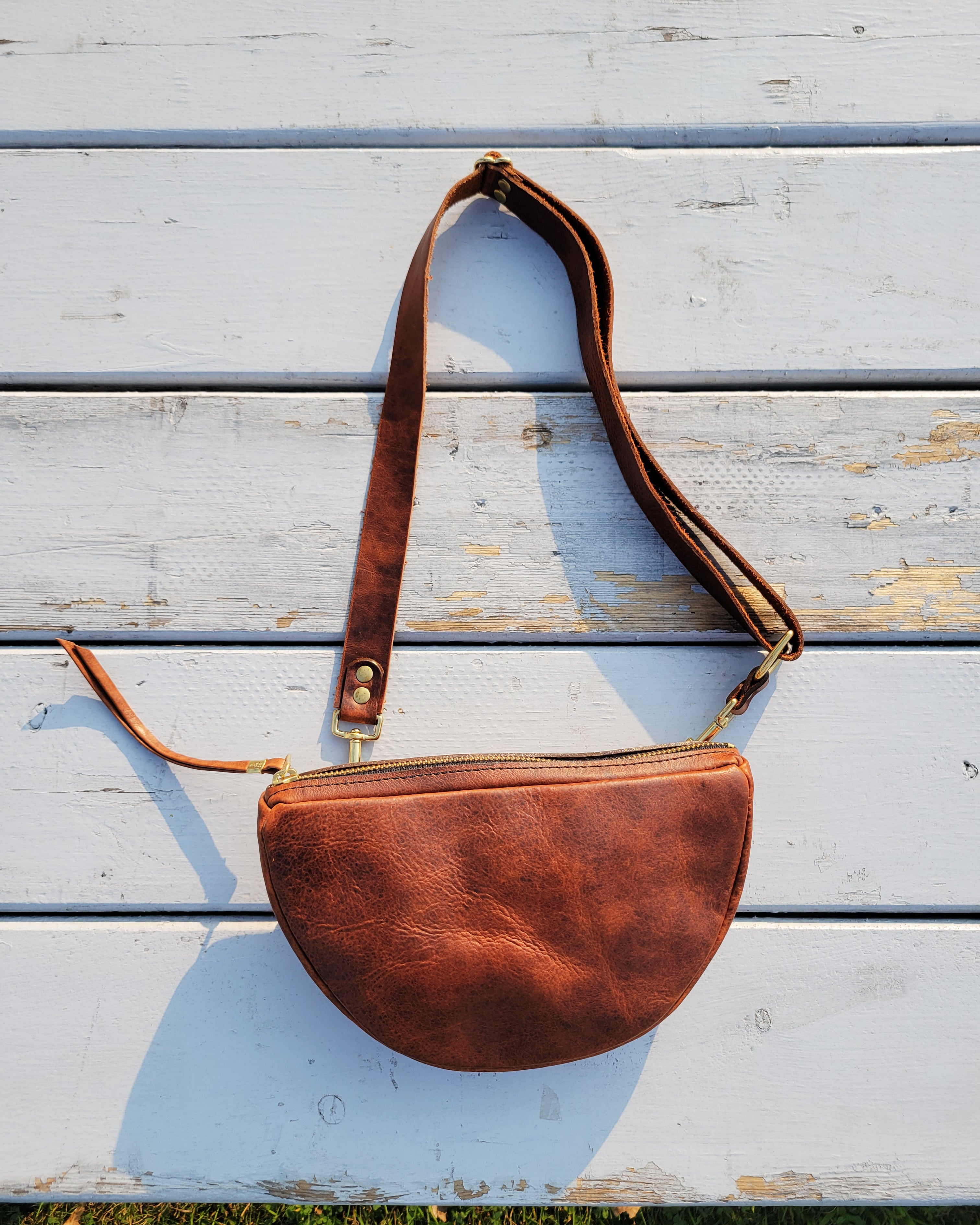 Half circle leather bag